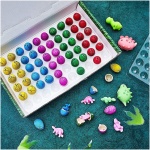 Nyganmelloz 60 Pieces تخم دایناسور اسباب بازی تخم مرغ دینو در آب رشد می کند جوجه ریزی در آب استخر بازی کیت های علمی کرک اسباب بازی جدید مینی تخم مرغ داینا برای دختران هدیه تولد اسباب بازی های جشن تولد - Image 3